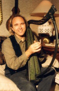 John Doan with a celtic harp
