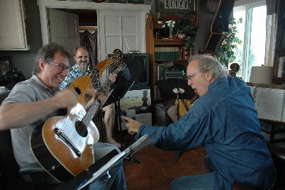 john doan harp guitar retreat john holds guitar over head of student threateningly john doan harp guitar retreat john holds guitar over head of student threateningly