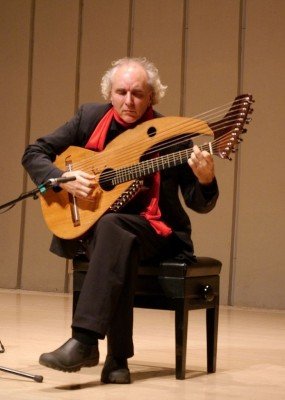 John Doan Xian China during concert playing harp guitar